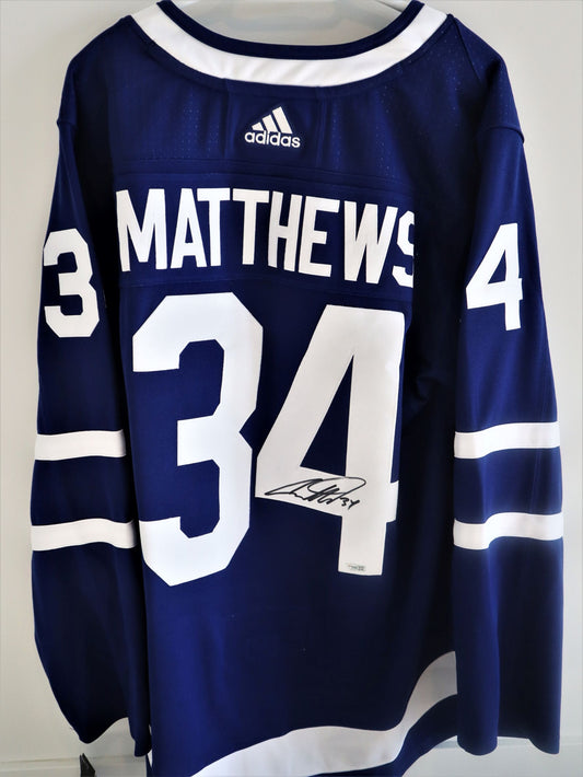 Auston Matthews  Authentic Adidas Autographed Jersey includes Fight Strap and COA. Size 54